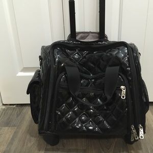 Travel Smith patent leather wheeled carry on